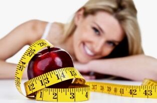 Apfel und Zentimeter, um Gewicht zu verlieren